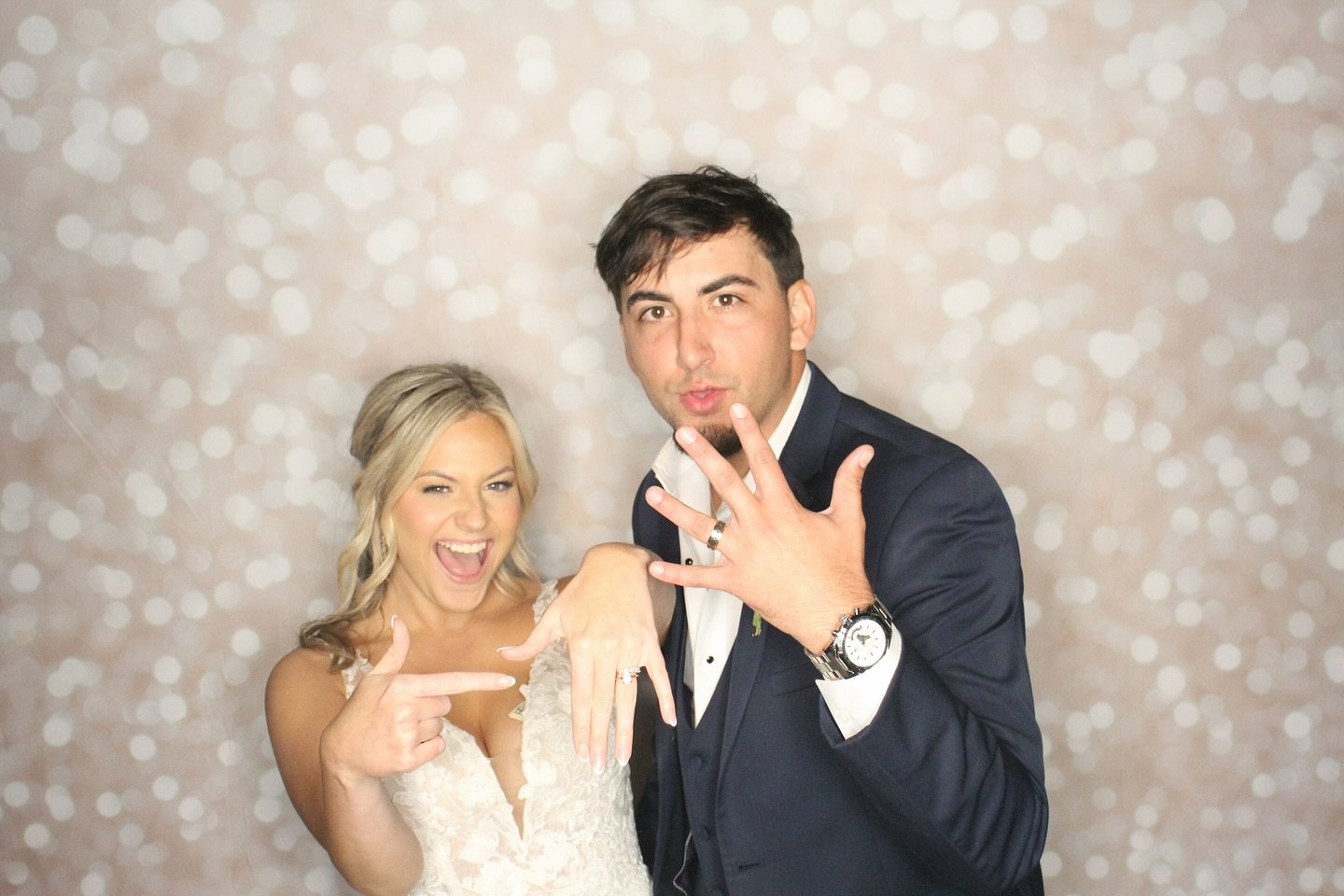 Newlyweds in photo booth